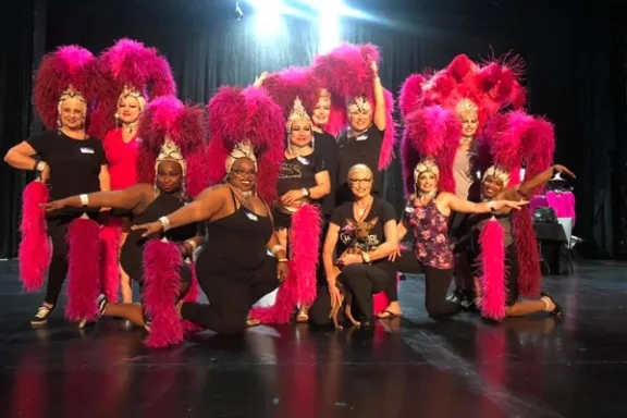 a group of people posing for the camera